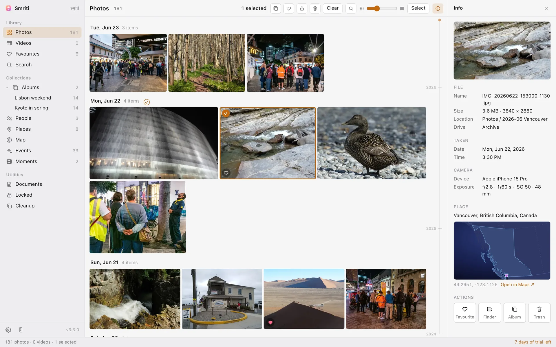 Smriti: one window with a sidebar, a date-grouped photo grid, and an Info panel showing the selected photo's camera and place.